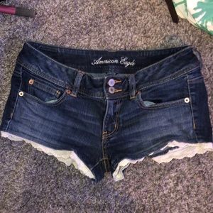 american eagle stretch shorts with lace at end